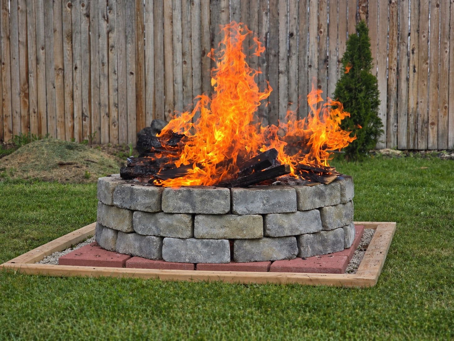 Freshly stacked fire ring stones in the backyard